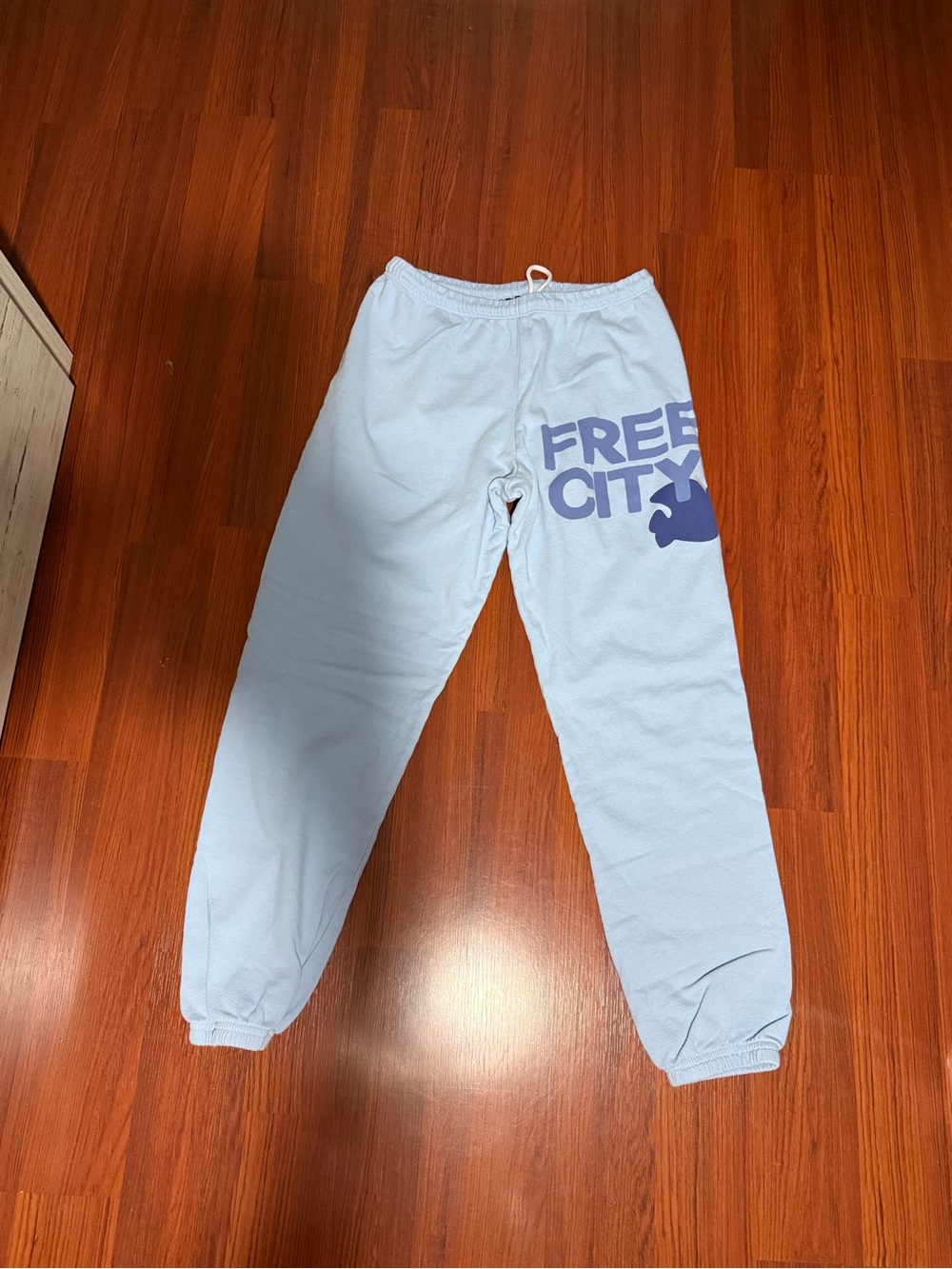 freecity women Pale Blue Sweatpants with Navy Logo